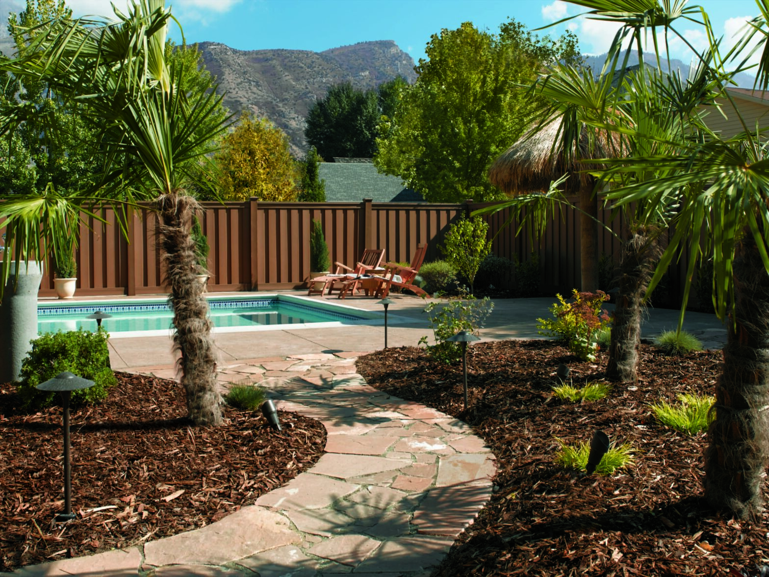 Photo of residential Trex fencing installed in a backyard