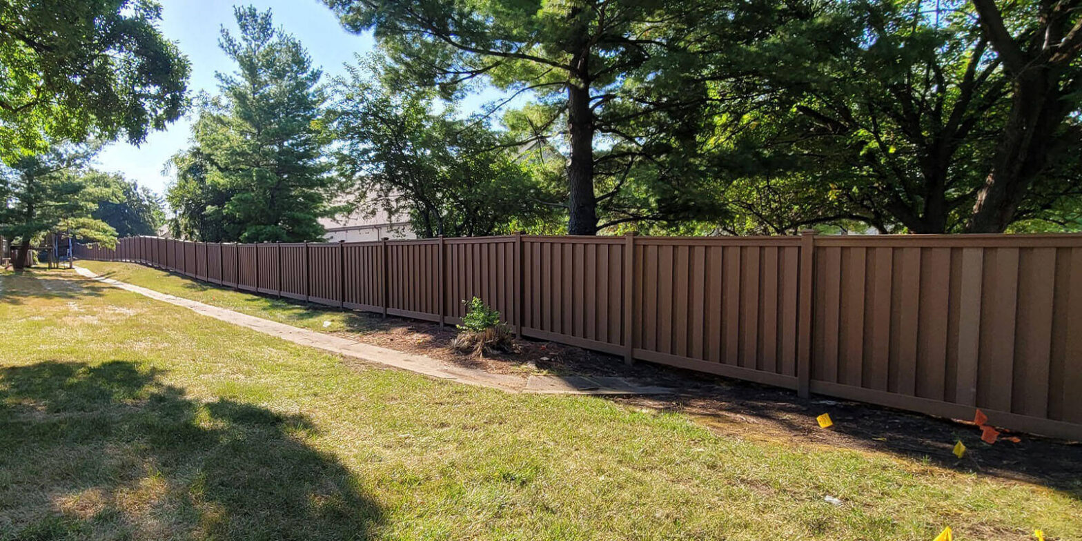 Brown composite privacy fence