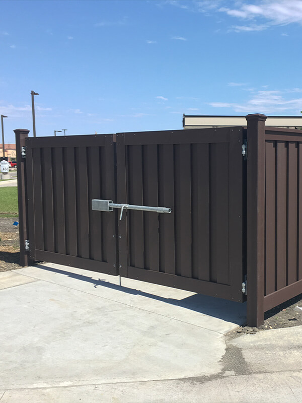 Fence Contractor Installing Trex Fence