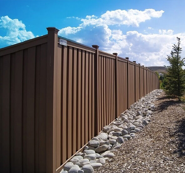 Residential Trex composite fence with vertical boards