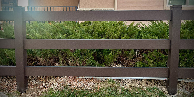 Post and rail farm fence