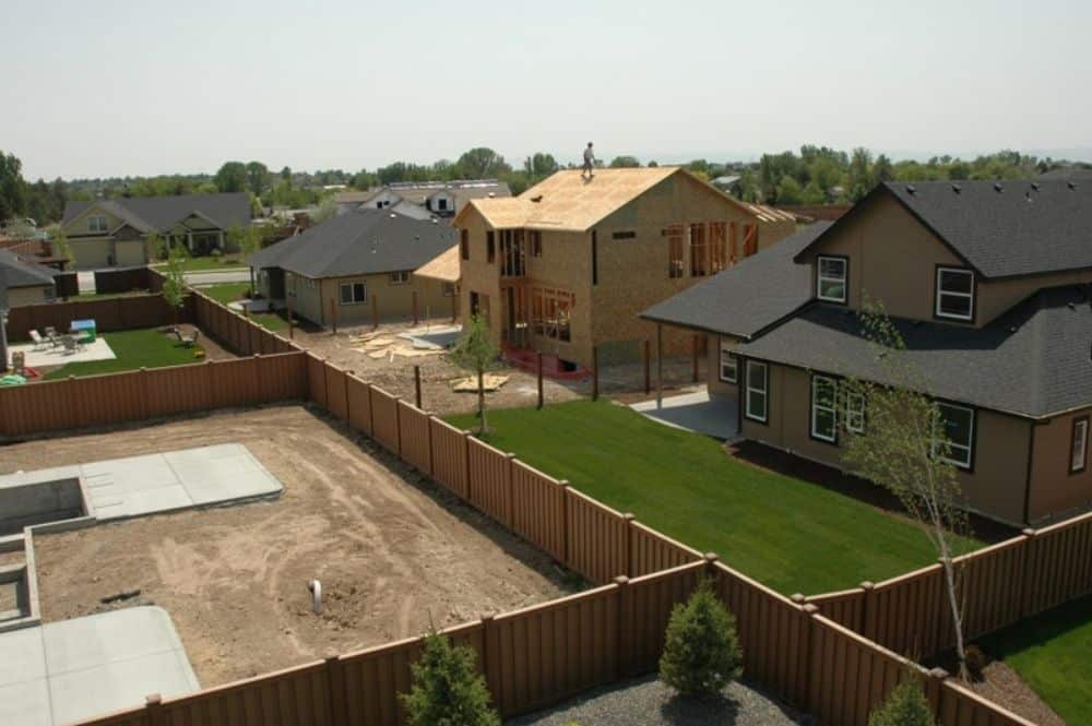 A new construction subdivision showcasing Trex fencing compliance and regulations.